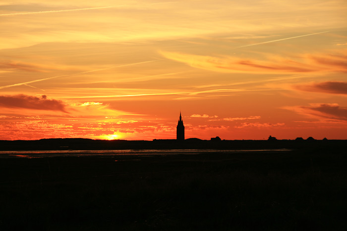 Sonnenuntergang vom Deich aus betrachtet