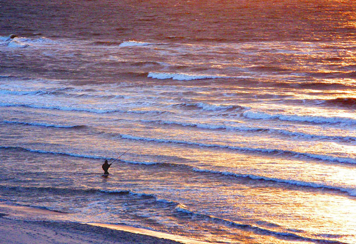 Abend-Angler am Hauptstrand